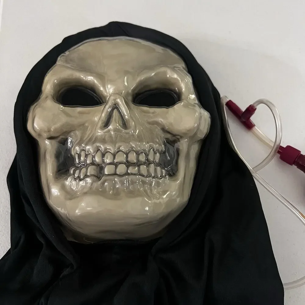 Fun World Skull Mask Bleeding Dripping with Blood Heart Pump